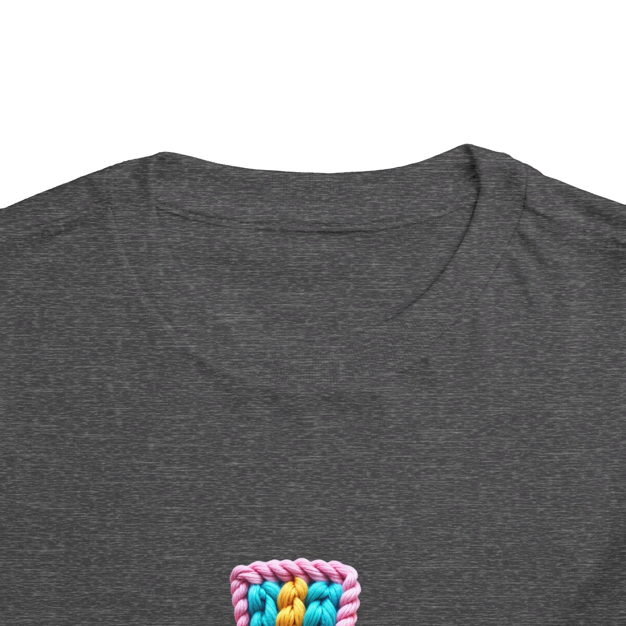 Easter Cross Toddler Tee — Colorful Knit Cross with "He is Risen" & Easter Eggs