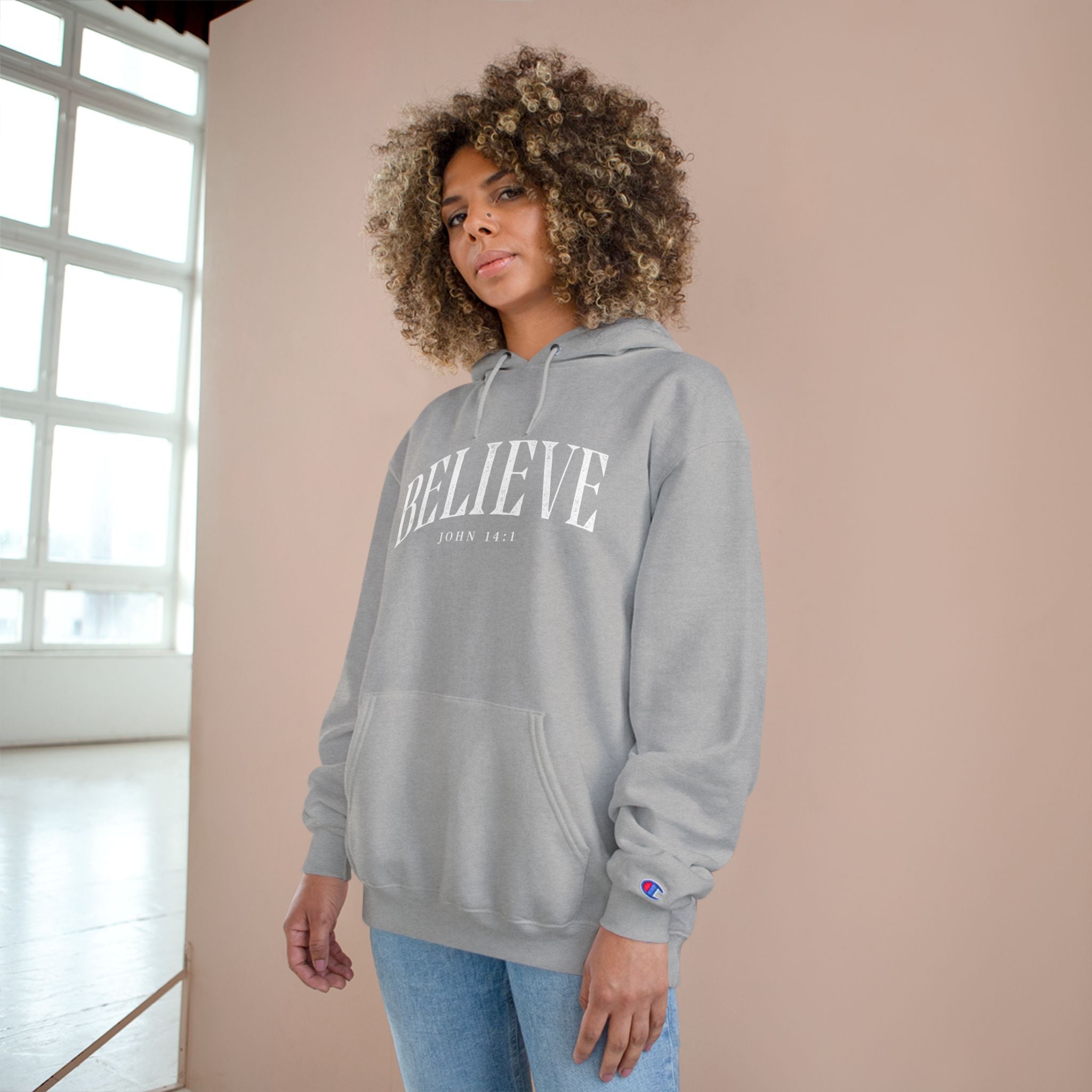 Believe Champion Hoodie — Inspirational Pullover with 'Believe' Script