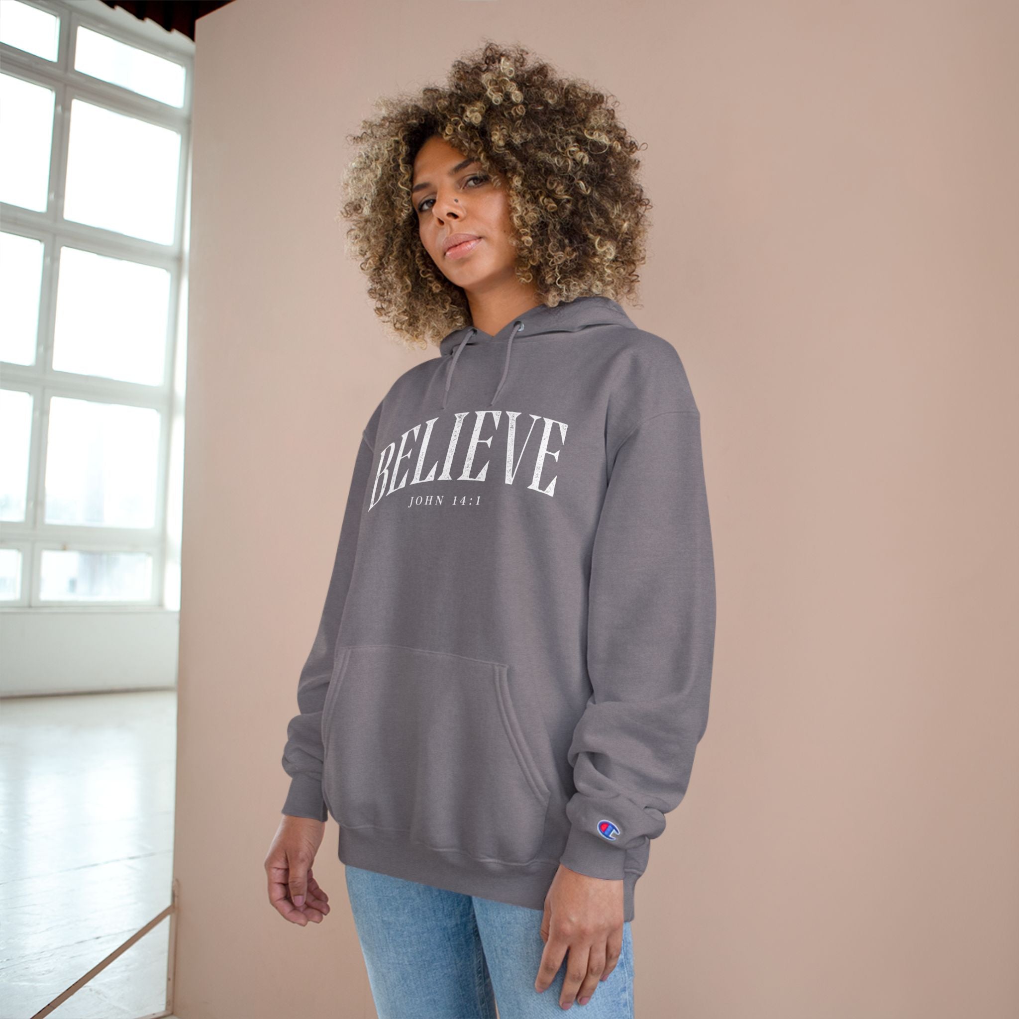 Believe Champion Hoodie — Inspirational Pullover with 'Believe' Script