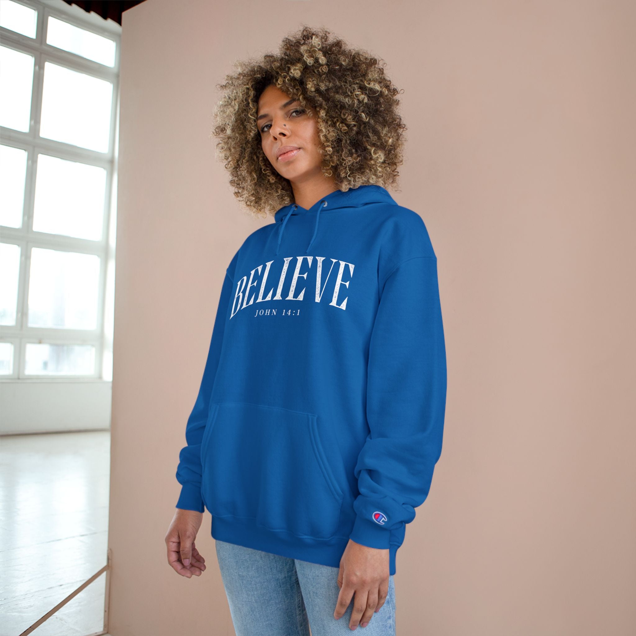 Believe Champion Hoodie — Inspirational Pullover with 'Believe' Script