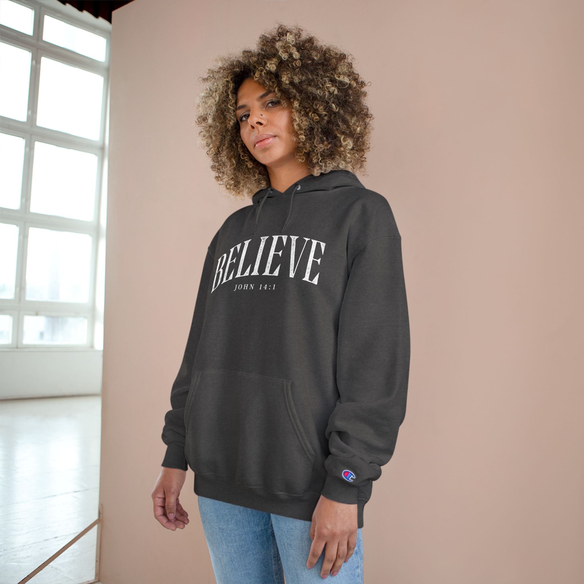 Believe Champion Hoodie — Inspirational Pullover with 'Believe' Script