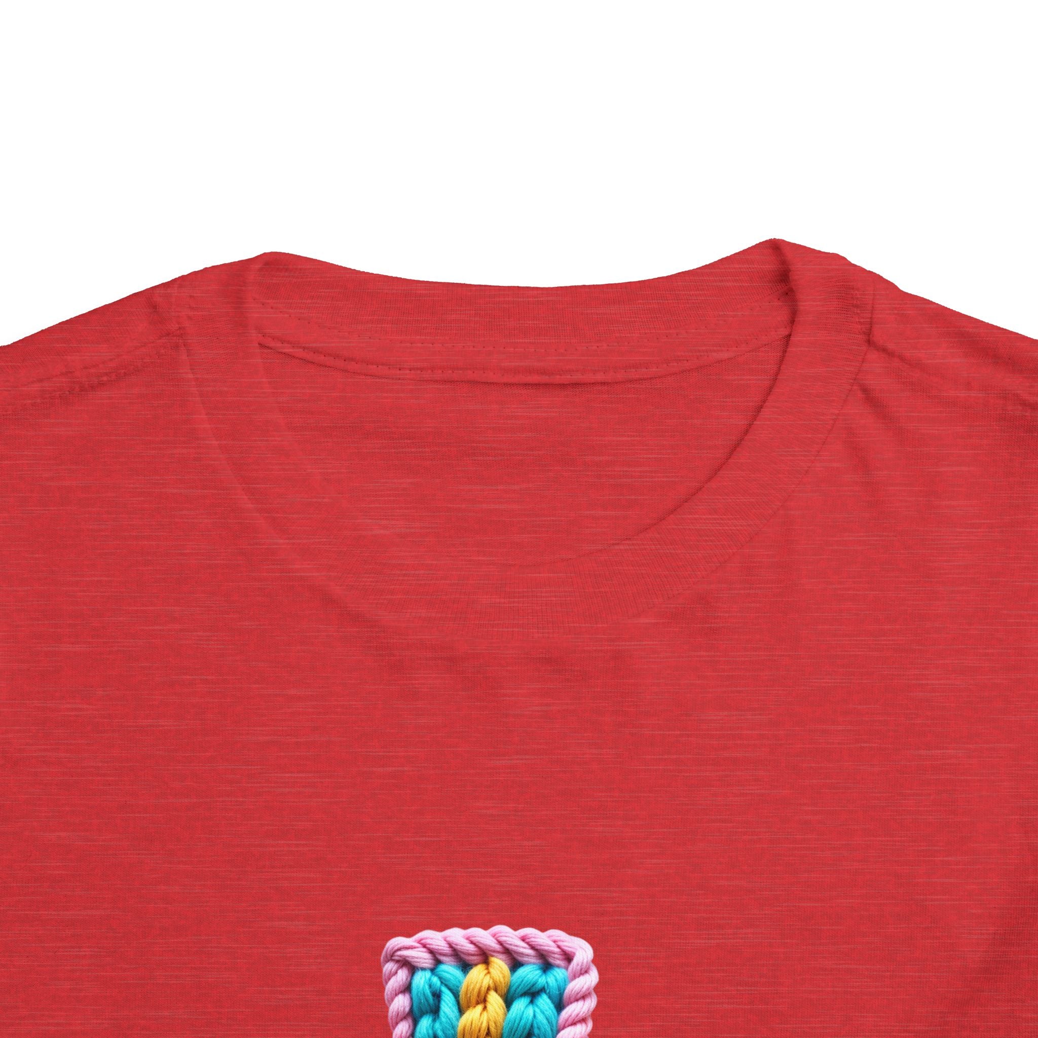 Easter Cross Toddler Tee — Colorful Knit Cross with "He is Risen" & Easter Eggs